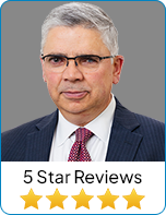 Professional headshot of a male attorney in a suit for legal representation.