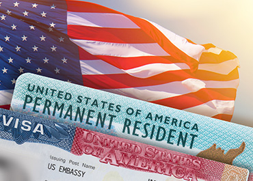 US Permanent Resident Card and American flag for New Jersey immigration law.